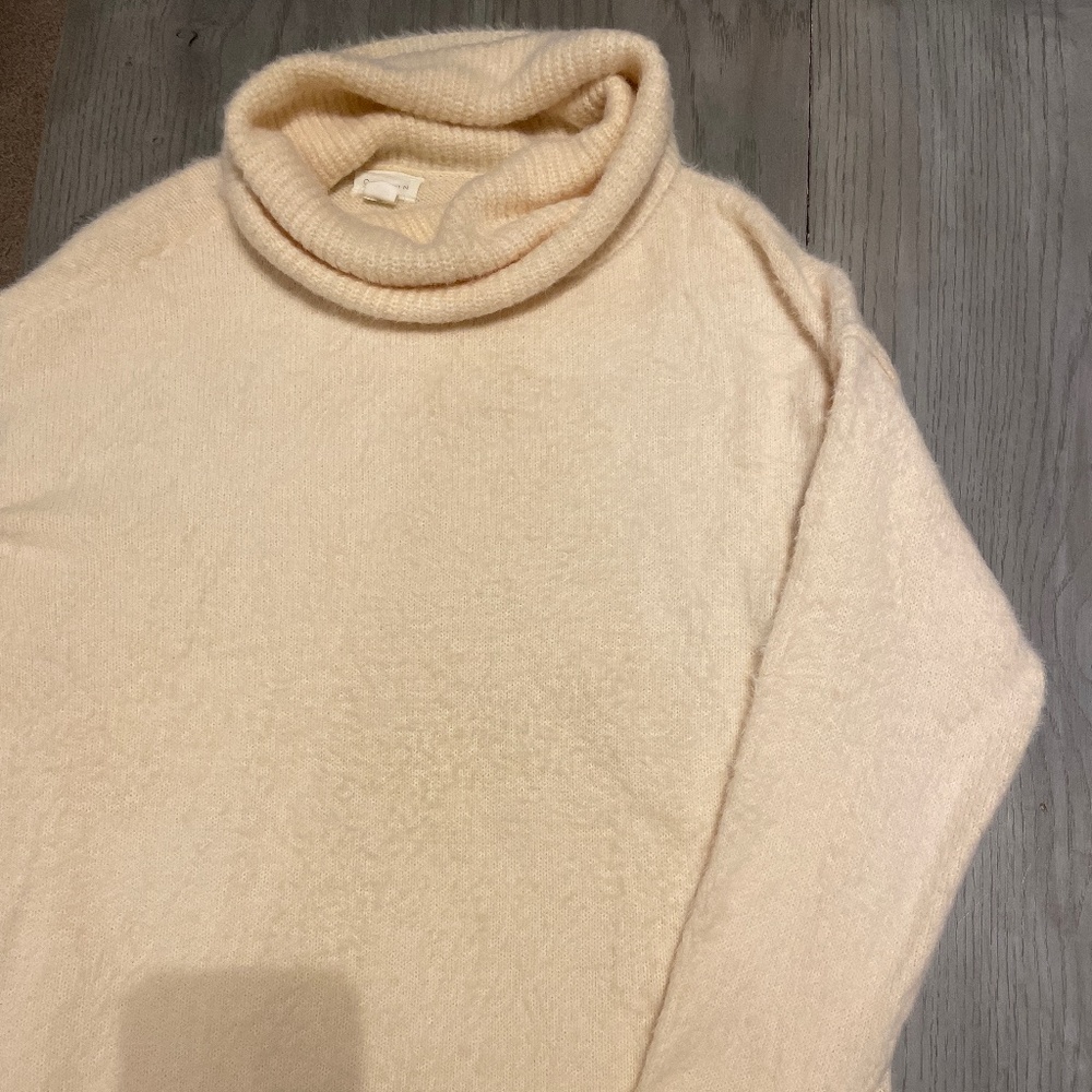 Soft cowl neck cream sweater